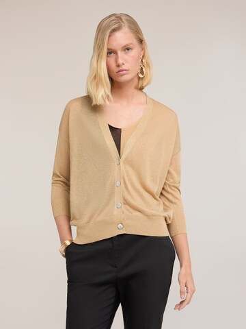 Cardigan MOTIVI en or