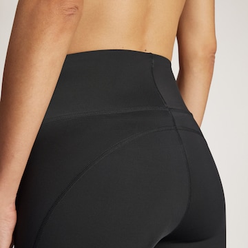ADIDAS BY STELLA MCCARTNEY Skinny Sportnadrágok 'Yoga 7/8' - fekete
