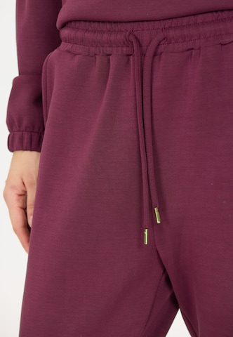 Athlecia Tapered Sports trousers 'Jacey' in Red
