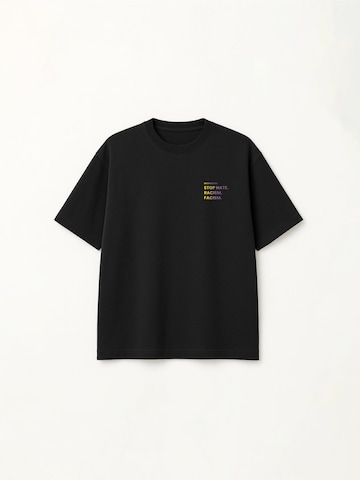 DROP.GOODS Oversized Shirt 'Statement' in Black: front