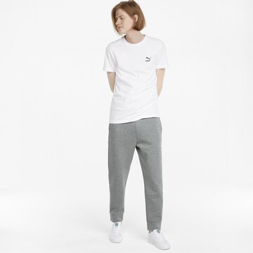 PUMA Tapered Sportbroek in Grijs