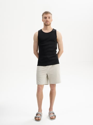 MELA T-shirt 'CHETAN' i svart