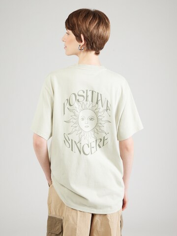 OH APRIL Oversized shirt 'Positive' in Green: front