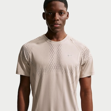 NIKE Performance Shirt 'STRIDE NVLTY' in Grey
