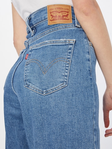 LEVI'S ® Tapered Jeans 'High Waisted Mom Jean' in Blue