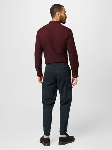 BURTON MENSWEAR LONDON Tapered Cargobroek in Groen