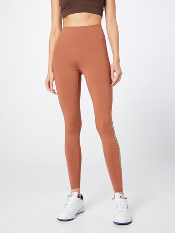Slimfit Pantaloni de la Calvin Klein Sport pe maro: față
