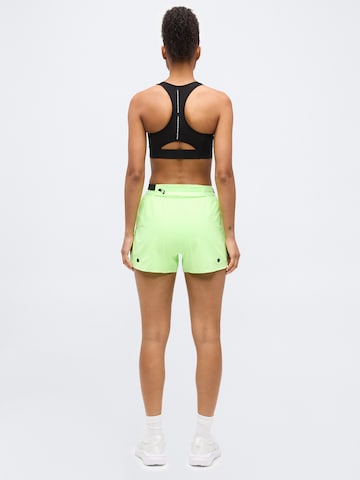 ASICS Regularen Športne hlače | zelena barva
