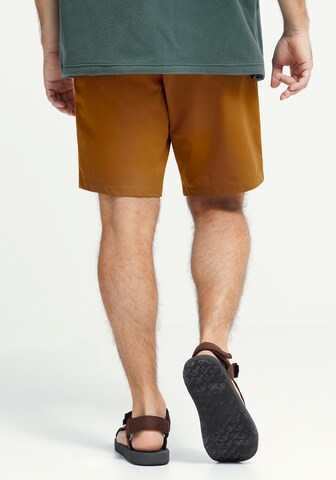 JACK WOLFSKIN Sandals in Red
