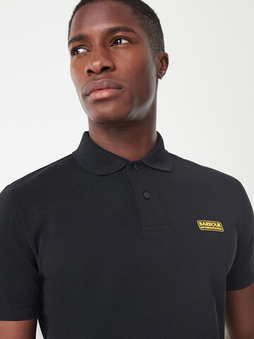 Barbour International Poloshirt in Schwarz