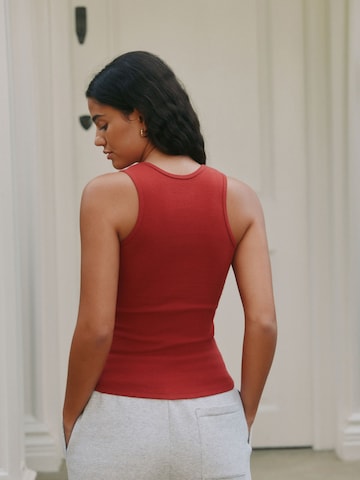 Top di self. in rosso