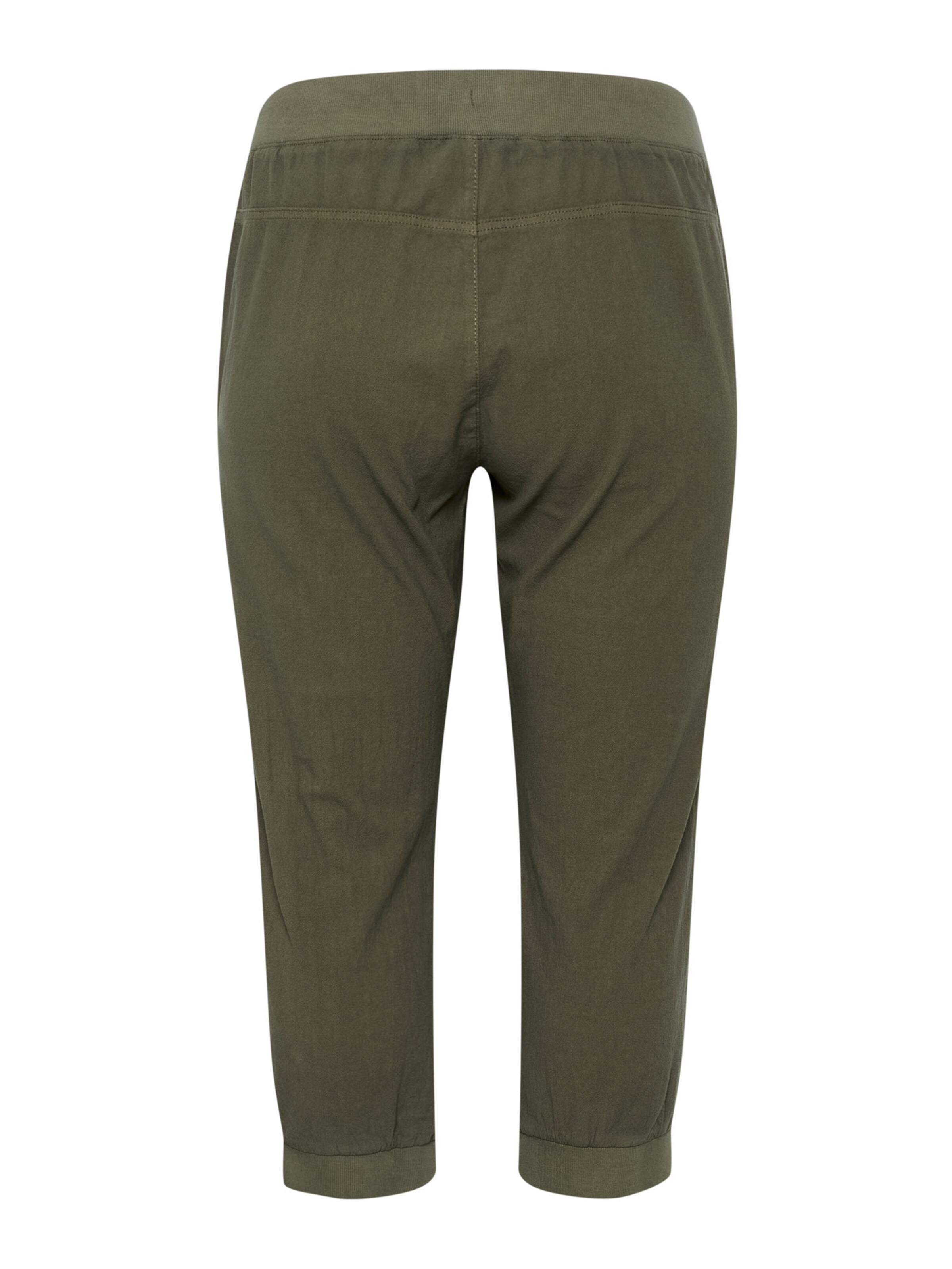 KAFFE CURVE Zwężany krój Spodnie 'Nana' w kolorze zielony