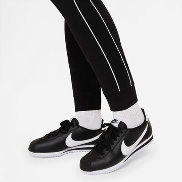 Effilé Pantalon Nike Sportswear en noir