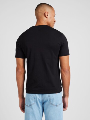 Maglietta 'American Tradition' di GUESS JEANS in nero