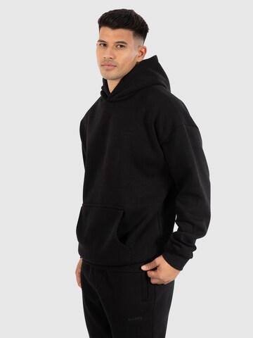 Veste de survêtement 'Rami' Smilodox en noir