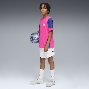 T-Shirt fonctionnel 'Manchester City' PUMA en rose