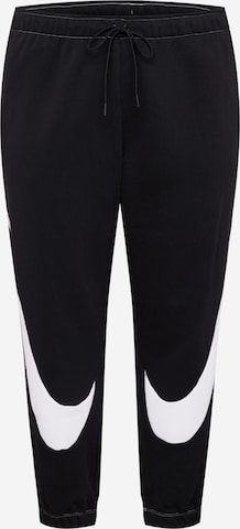 Nike Sportswear Tapered Workout Pants in Black: front