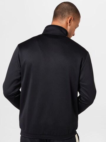 Karl Kani Fleece Jacket in Black