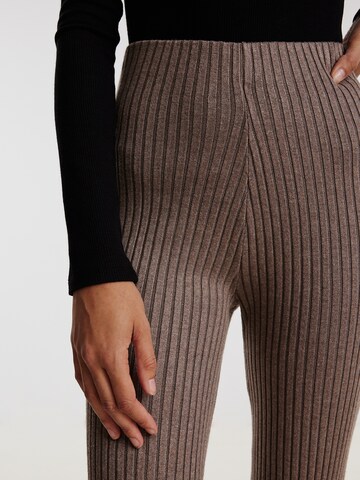 EDITED Flared Trousers 'NOHEA' in Beige