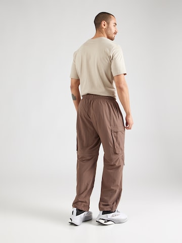 ADIDAS SPORTSWEAR Loose fit Outdoor trousers 'City Escape' in Brown