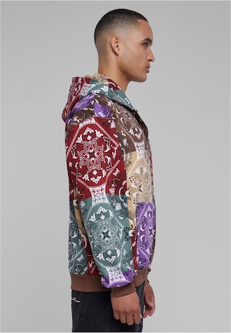 Veste de survêtement Karl Kani en mélange de couleurs