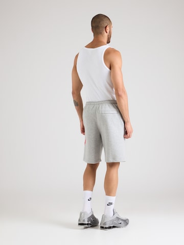 Nike SportswearLoosefit Hlače 'CLUB' - siva boja
