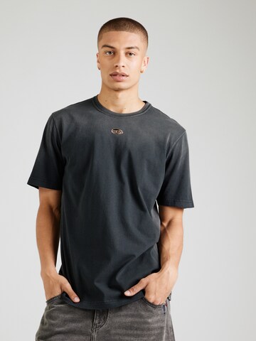 DIESEL T-shirt 'ADJUST-T1' i svart: framsida