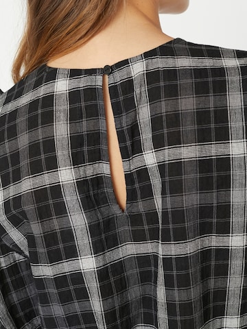 Chemisier 'Sally' co'couture en noir