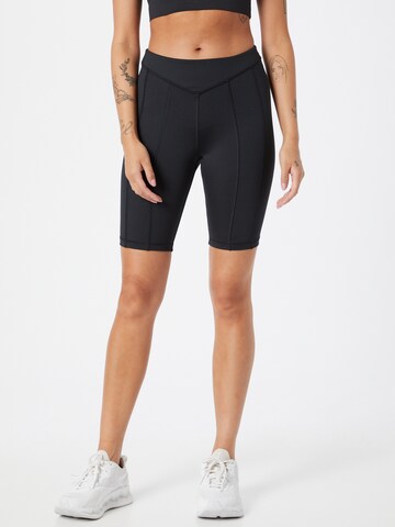 Reebok Skinny Workout Pants in Black: front