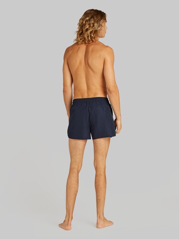 Calvin Klein Swimwear Plavecké šortky 'RUNNER' – modrá