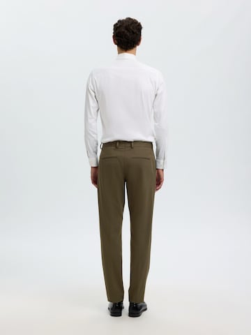 Coupe slim Pantalon à plis 'SLMLOMAIR' SELECTED en vert