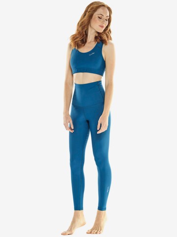 Winshape Skinny Sportovní kalhoty 'HWL112C' – modrá