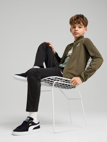 PUMA Joggingpak in Groen: voorkant
