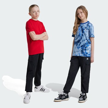 ADIDAS ORIGINALS Tapered Byxa i svart: framsida