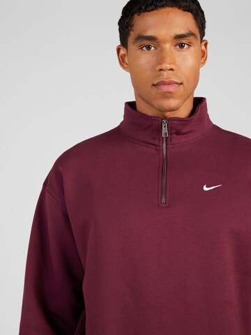 Sweat-shirt Nike Sportswear en rouge