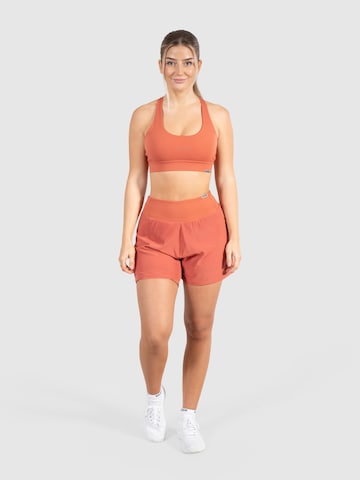 Smilodox Loosefit Sportbroek 'Advance Pro' in Oranje