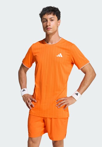 ADIDAS PERFORMANCE - Camiseta funcional 'Freelift Pro' en naranja: frente