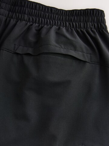 Tapered Pantaloni cu buzunare de la Next pe negru