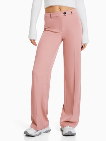 Bershka Pleated Pants in Pink: front
