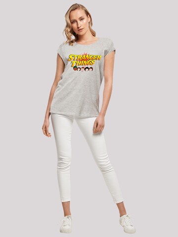 T-shirt 'Stranger Things Comic Heads Netflix TV Series' F4NT4STIC en gris