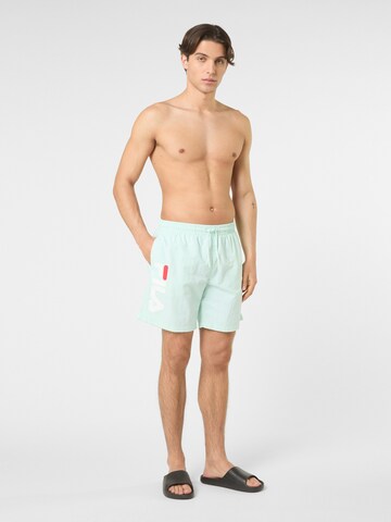 Pantaloncini da bagno 'CARAVELLO regular logo beach shorts' di FILA in blu