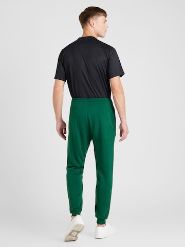 Reebok Zúžený strih Športové nohavice 'IDENTITY' - Zelená