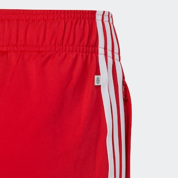 ADIDAS ORIGINALS Tapered Παντελόνι 'Adicolor Sst' σε κόκκινο