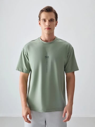 T-Shirt Tommy Life en vert : devant