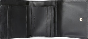 Porte-monnaies TOMMY HILFIGER en noir