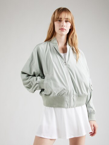 Nike Sportswear Between-season jacket 'ESSNTL' in Green: front
