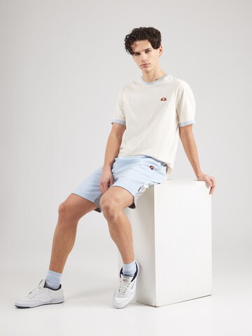 Tricou 'MEDUNITOS' de la ELLESSE pe alb