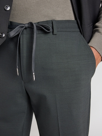 Michael Kors Slimfit Spodnie w kant w kolorze zielony