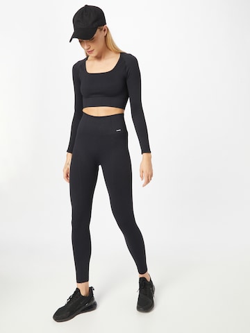 Skinny Pantaloni sportivi di aim'n in nero