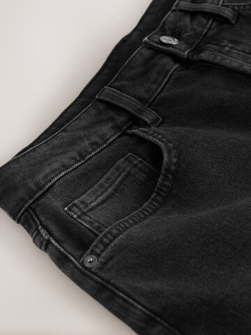 Bootcut Jeans di Next in nero